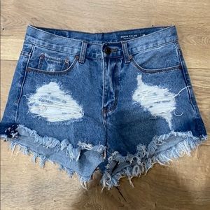 Denim Colab distressed denim shorts